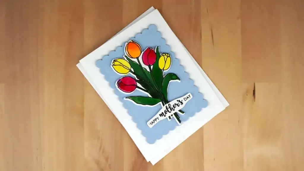 A Mother's Day greeting card with a bouquet of tulips on it.