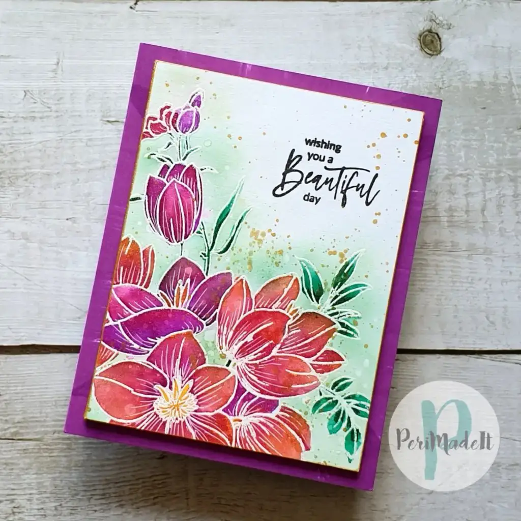 A card featuring purple flowers created using one of the 4 ways to watercolor.