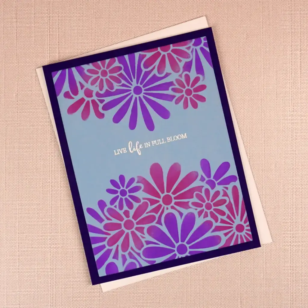 A jaw-dropping card with purple and blue flowers on it.