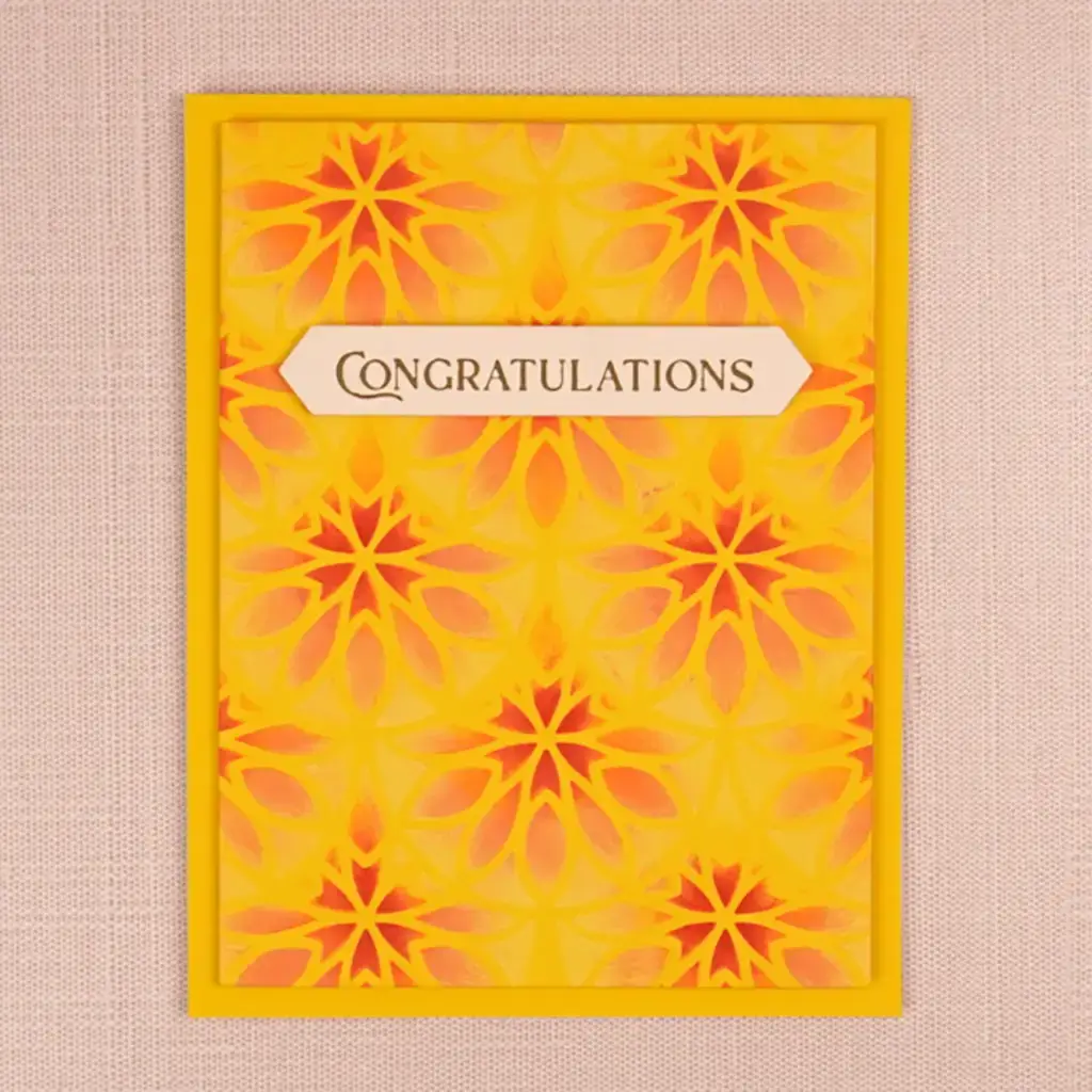 Congratulations card with a yellow and orange floral pattern.