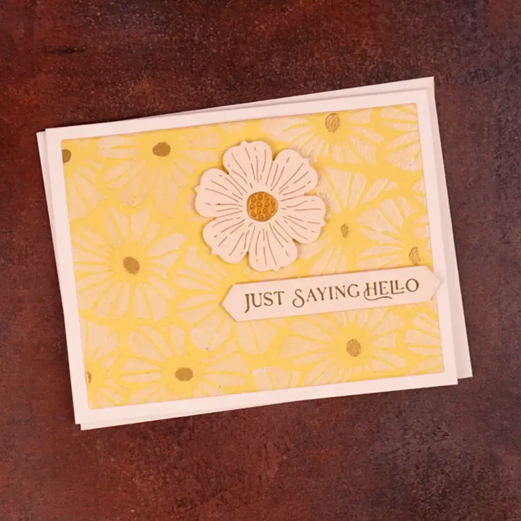 A card with a flower and text on it.