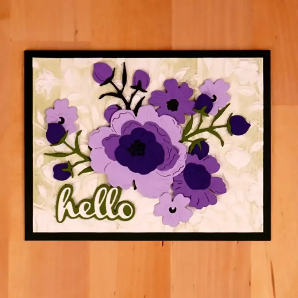 A floral greeting card with purple flowers and a hello on it.
