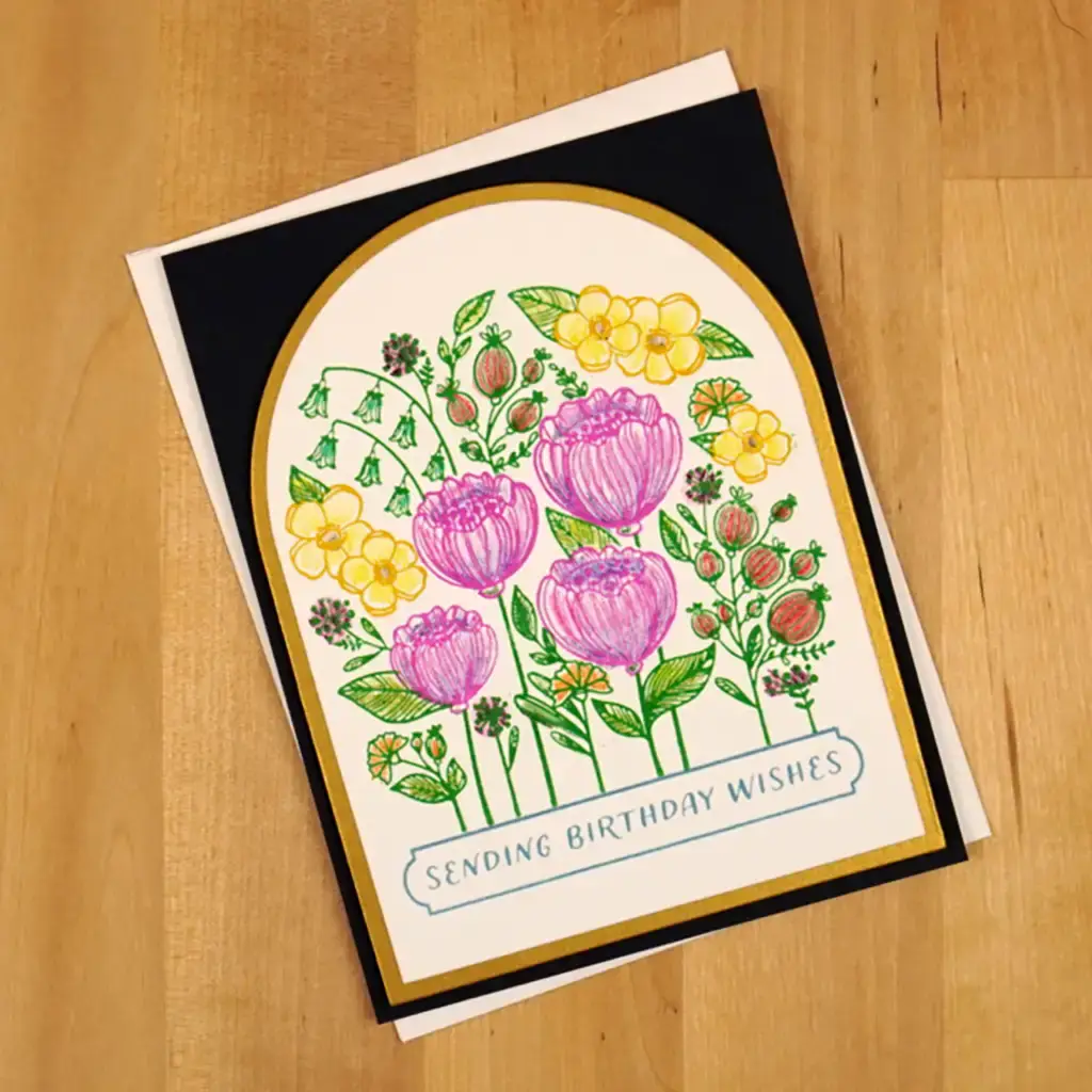A greeting card created using the versatility of the new Registration Place & Press collection with flowers on it.
