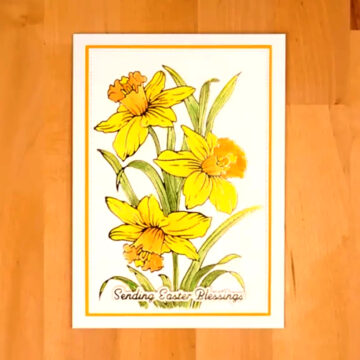 A card with yellow daffodils on it that is sure to stand out.