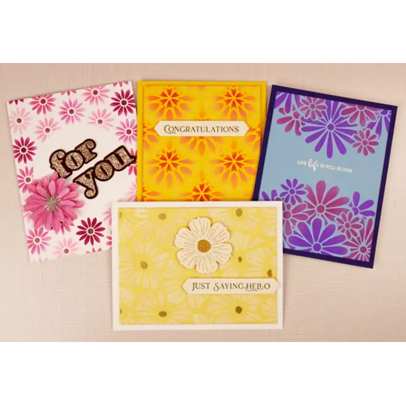 Four greeting cards with flowers on them.