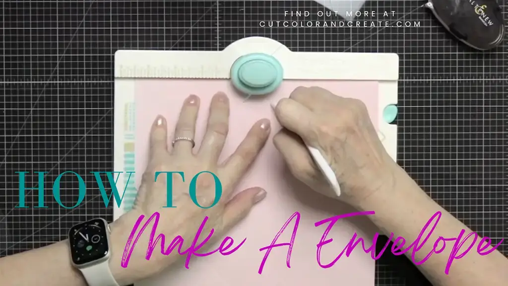 Tutorial Picture of someone making an envelope while cardmaking.