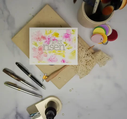 Handmade Easter card featuring a beautiful embossed floral background.