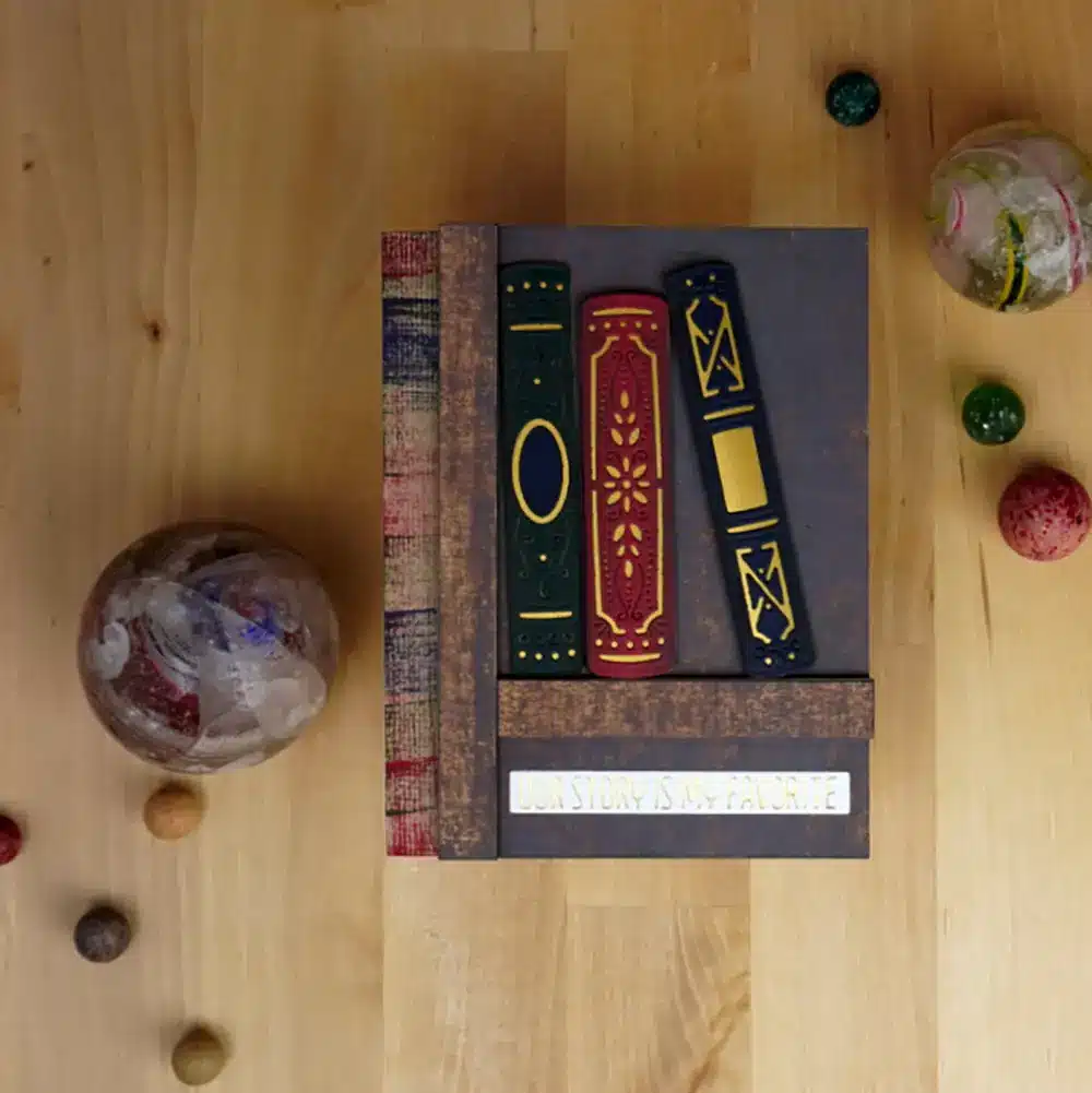 Greeting Card featuring large fancy books sitting on a bookshelf.