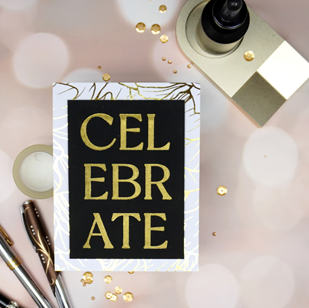 Elegant Handmade Greeting card featuring "Celebrate" in gold made with the Celebration Flowers registration plate from the new Spellbinders release.