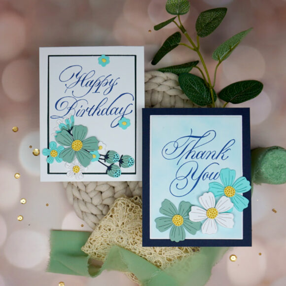 Pair of Lovely Handmade Copperplate Letterpress cards with die-cut flowers decorating them.
