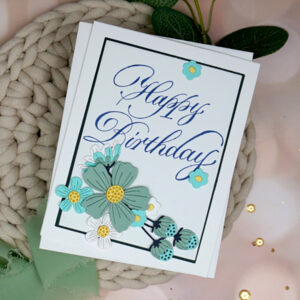 Handmade Copperplate Birthday card with die-cut flowers on it.
