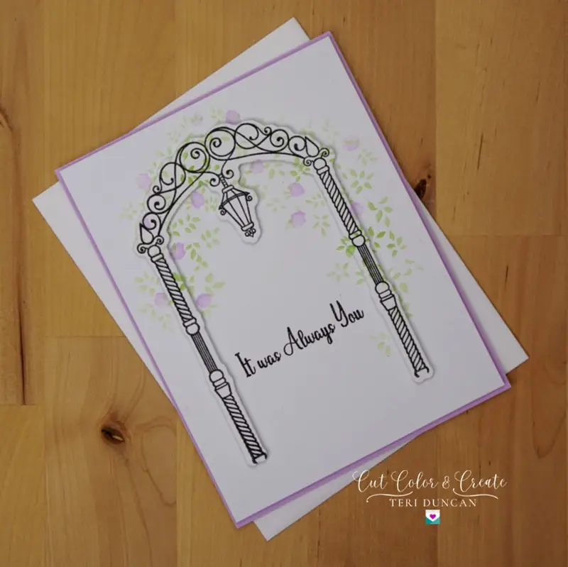 Adorned with lilac and green stenciled wisteria cascading over a wedding arch, the It Was Always You wedding card brings a touch of nature's elegance to your message.