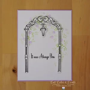 Adorned with lilac and green stenciled wisteria cascading over a wedding arch, the It Was Always You wedding card brings a touch of nature's elegance to your message.