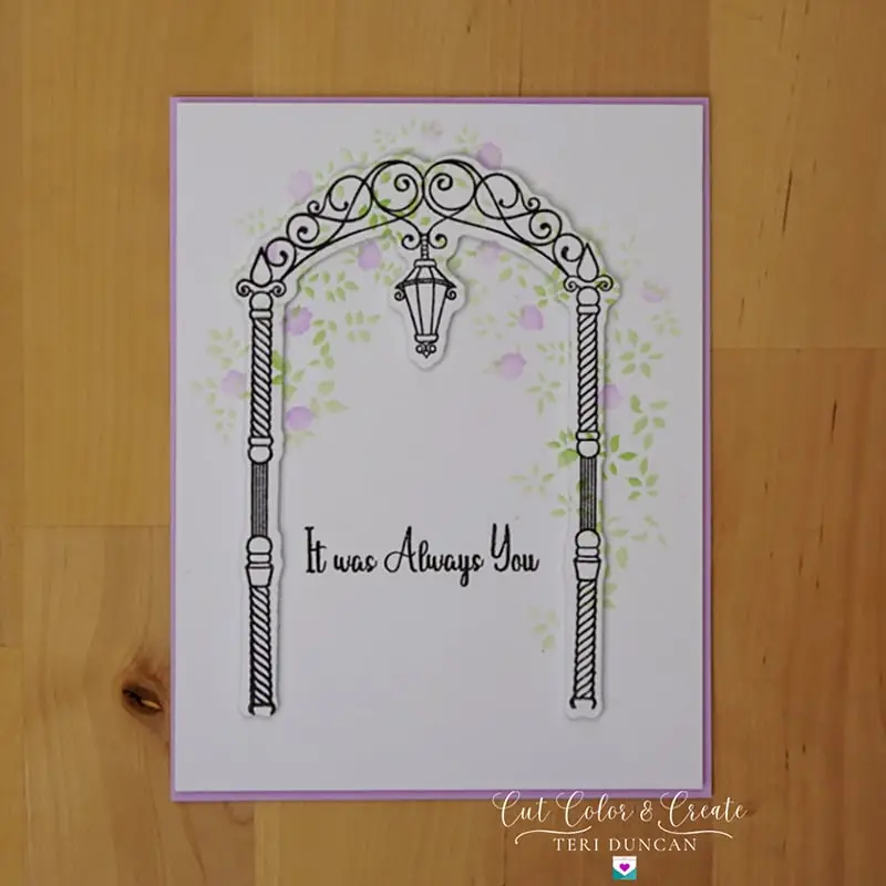 Adorned with lilac and green stenciled wisteria cascading over a wedding arch, the It Was Always You wedding card brings a touch of nature's elegance to your message.