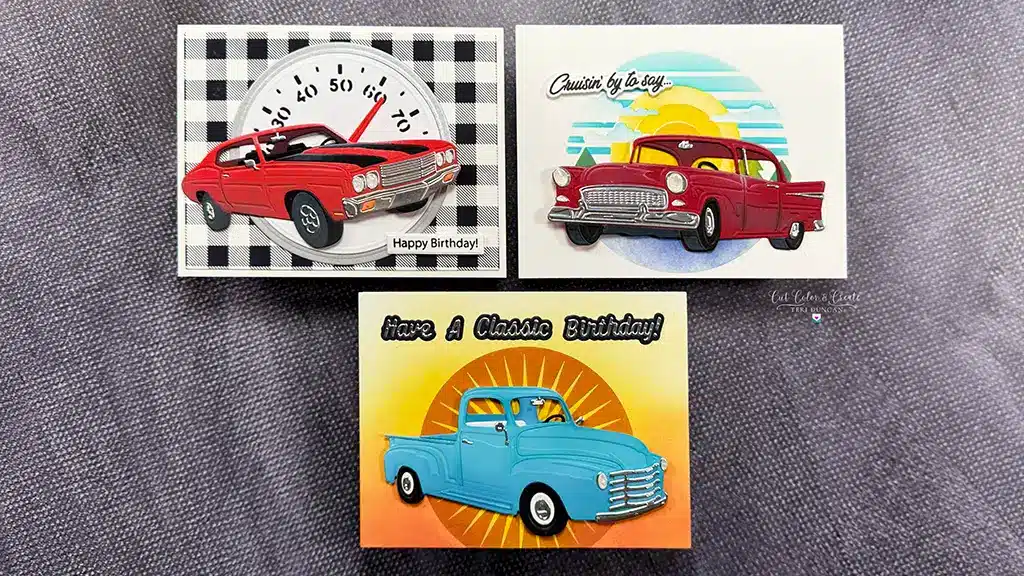 Three birthday cards from the Classic Road Legends collection: a red car on a checkered background, a red car by the sea, and a blue truck with a sunburst backdrop.