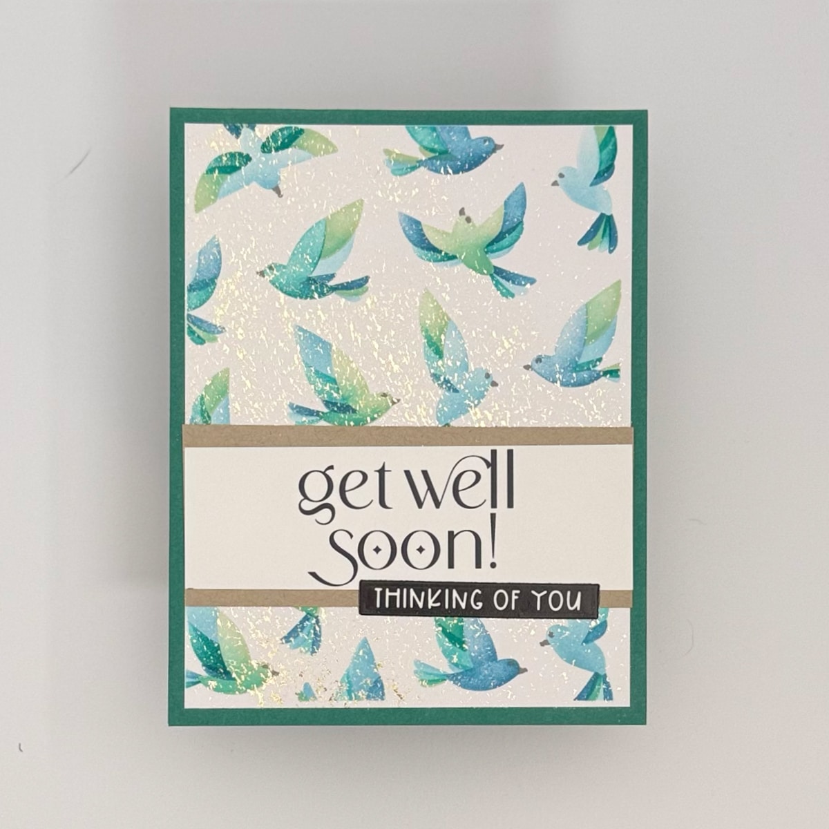 A set of 4 handmade cards featuring Flit & Flitter—blue and green birds—with the text "get well soon! thinking of you" on the front.